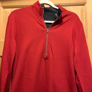 Dress that falls right below the knees. Pull over with front zip